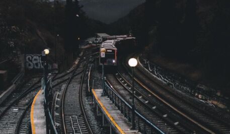 Train on railways during nighttime 716834